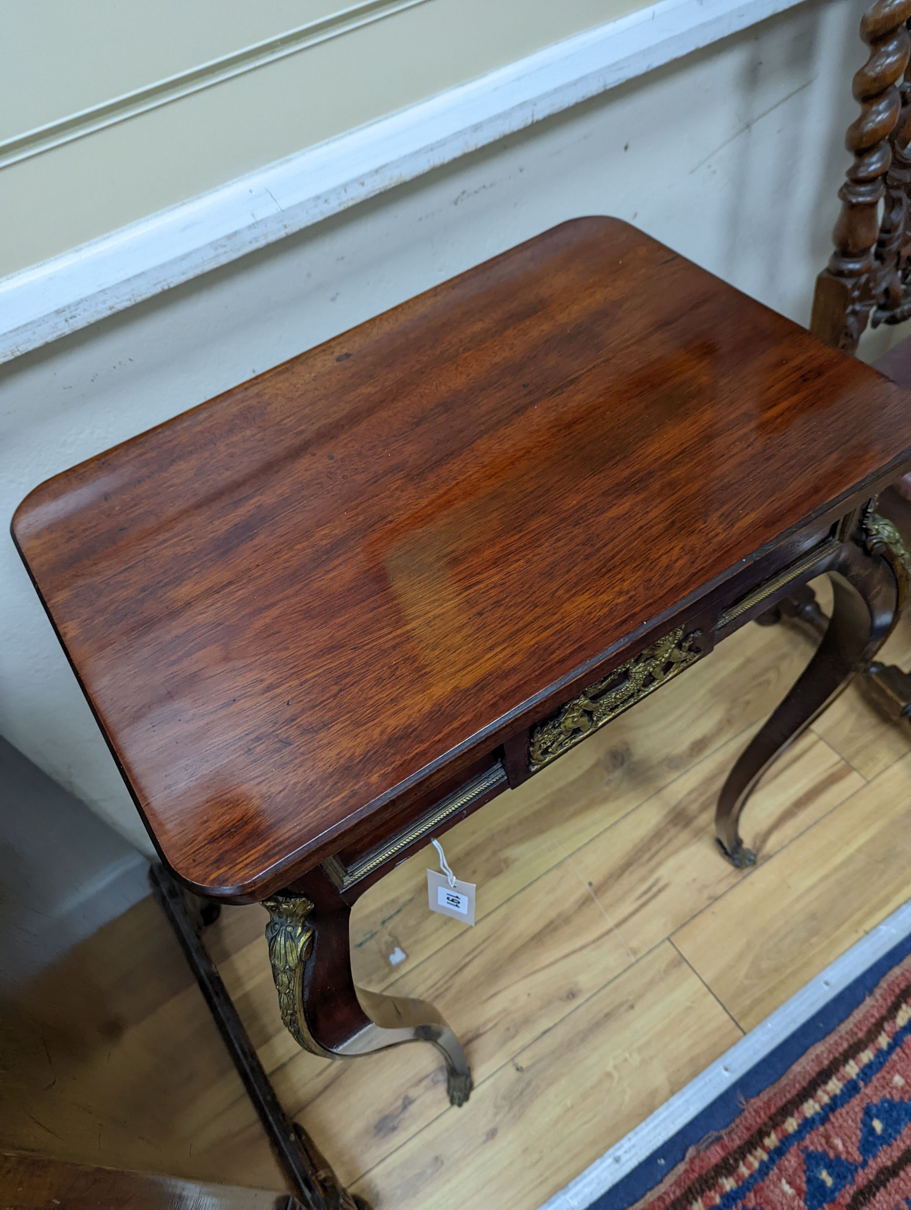 An early 20th century French rectangular gilt metal mounted mahogany small centre table with later top, width 55cm, depth 38cm, height 79cm